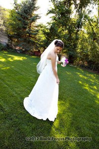 Summer bride on the lawn at the Briarhurst Manor